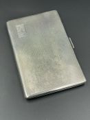 A silver cigarette case, hallmarked for Birmingham 1957 by Harmen Brothers (Total Weight 188g)