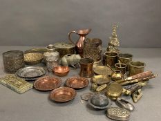 A selection of copper and brass including copper Persian dishes, a frog ashtray and white metal