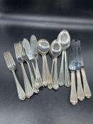 A Four place setting of silver cutlery (1470g Total Weight excluding knives 3 knives only) by Arthur