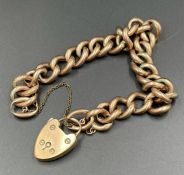 A 9ct rose gold bracelet with heart shaped fastener (15.7g)