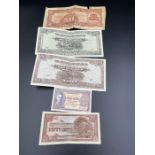 A small selection of banknotes from Chinese, Japanese and Malay banknotes