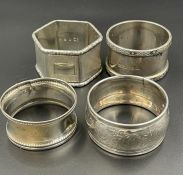 Four assorted silver napkin rings, various makers and hallmarks (Total weight 115g)