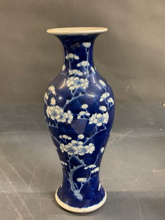 A blue and white cherry blossom vase marked to base (H26cm)