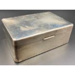 A silver cigarette box, hallmarked for Birmingham by Adie Brothers Ltd, 1927