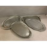 A selection of pewter trays various sizes