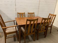 A Mid Century dining table with four chairs and two carvers (H74cm W166cm open) (W123cm D82cm