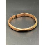A 9ct gold bangle AF (Total weight 6.4g)