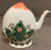 An early (Possibly 1666-1676) Chinese porcelain small teapot, enclosed coverless on base rim