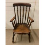 A high back spindle farmhouse chair