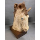 A classic horse head wooden sculpture (50cm x 37cm)