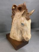 A classic horse head wooden sculpture (50cm x 37cm)