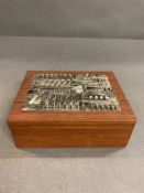 A Arnaldo Pomodoro Iltalian sculptural teak box, a sculptural metal top to teak box the interior