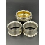 Two silver napkin rings and a cruet (Total weight 95g)