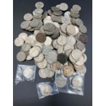 A quantity of sixpences including pre 1947 silver ones