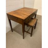 A mahogany dressing/washing table and seat, hinged lid opening to a fitted interior incorporating