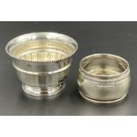 Two silver items, a napkin ring and a small cruet. (Total weight 39g)