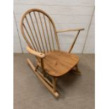 A blonde Ercol rocking chair AF