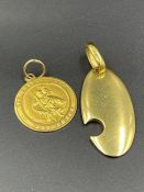 Two 18ct gold pendants including a St Christopher. (Total Weight 14.6g)