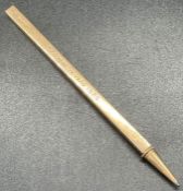 A 9ct gold pencil with ruler marks, inscribed and originally given to a member of FRCS (Total Weight