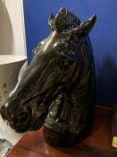 A carved horse head