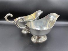 A Pair of silver sauce boats, hallmarked for Sheffield 1934 by William Hutton & Sons Ltd (Total