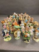 A large selection of Beswick Beatrix potters and other charter figurines some AF