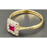 An 18ct gold and platinum ruby and diamond ring (2.1g)