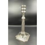 A Sterling silver candlestick (26 cm H)