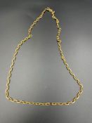 An 18ct (750) gold necklace (Total Weight 23.5g), total length 61 cm.