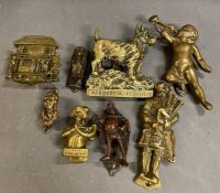 A selection of brass door knockers, various designs and ages.