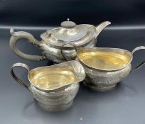 A Three piece Batchelors silver tea service, hallmarked for Chester 1915 by George Nathan & Ridley