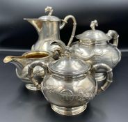 A Four Piece 19th/20th Century Silver tea Service by Tuck Chang and Co, in original box with