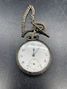 A silver pocket watch and silver Albert chain