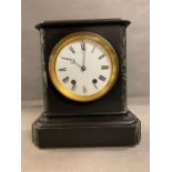 A marble and statue mantle clock stamped A.B