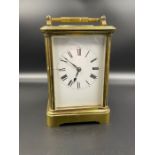 A French Brass carriage clock, with original key