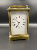 A French Brass carriage clock, with original key