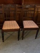 Two Mahogany open chairs with spindle backs and turned legs.