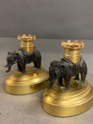 A pair of elephant bronzed candlesticks on gilt bases (H9.5cm W9cm)