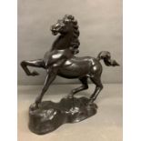 A cast of galloping horse metal ware sculpture (H46cm W55cm from leg to tail)