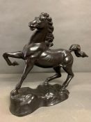 A cast of galloping horse metal ware sculpture (H46cm W55cm from leg to tail)