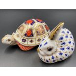 Royal Crown Derby paperweights, a tortoise and a rabbit