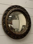 A circular wall mirror with carved surrounds (Dia45cm)