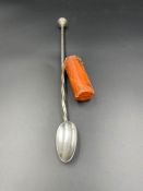 An antique silver sealing wax spoon, with wax