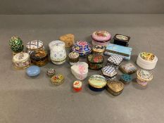 A selection of trinket boxes including Halcyon Dyas enamels