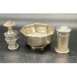 A hallmarked small silver bowl and two cruets