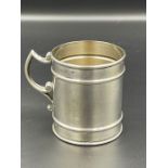 A small silver tankard by Crisford & Norris Ltd, hallmarked for Birmingham 1938