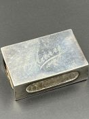 A silver matchbox cover, Birmingham hallmark for 1909 by Deakin & Francis Ltd