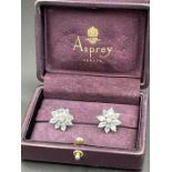 A Pair of Asprey Diamond and Aquamarine earrings
