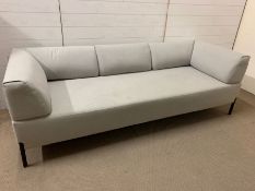 A contemporary three seater sofa on metal legs (H69cm W218cm D85cm SH 40CM)