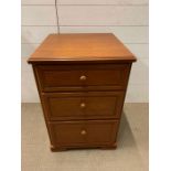 A Stag three drawer bedside cabinet (H70cm Sq40cm)